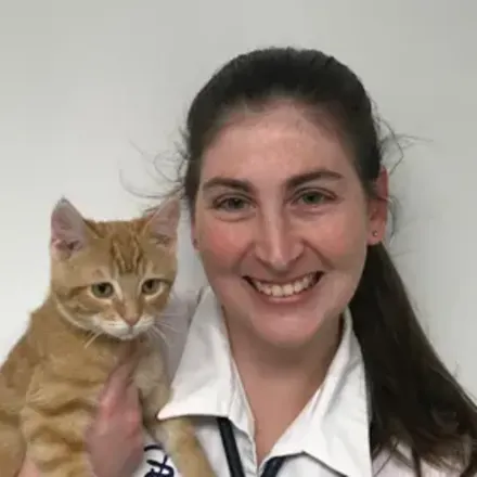Dr. Jennifer Wallace and cat on her shoulder
